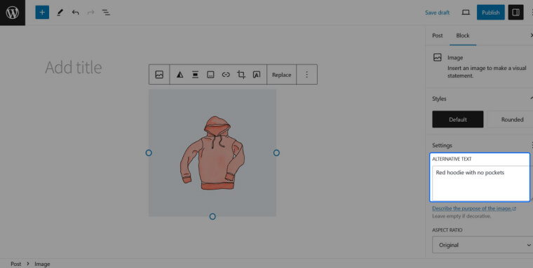 Screenshot of Wordpress block editor; an image of a red hoodie is selected, a field labeled &lsquo;Alternate Text&rsquo; contains the text &lsquo;Red hoodie with no pockets&rsquo; in the sidebar.